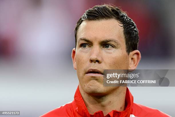 Switzerland's defender Stephan Lichtsteiner listens to the national anthem prior to a friendly football match between Switzerland and Peru on June 3...