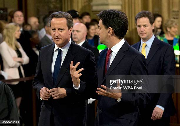 British Prime Minister David Cameron Deputy Prime Minister and leader of the Liberal Democrats Nick Clegg Leader of the Labour Party Ed Miliband walk...