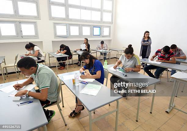 Tunisian students take the "baccalaureat" exam on June 4, 2014 in Tunis. AFP PHOTO / FETHI BELAID