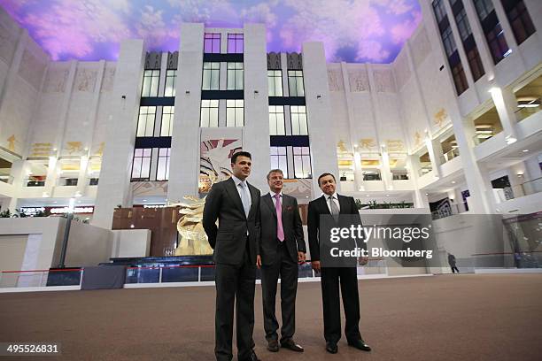 Aras Agalarov, founder of Crocus Group, right, Herman Gref, chief executive officer of OAO Sberbank, center, and Emin Agalarov, commercial director...