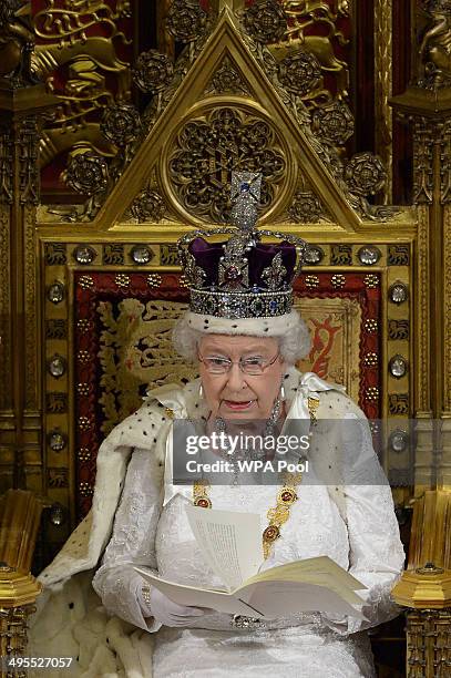 Queen Elizabeth II delivers her speech during the State Opening of Parliament in the House of Lords at the Palace of Westminster on June 4, 2014 in...