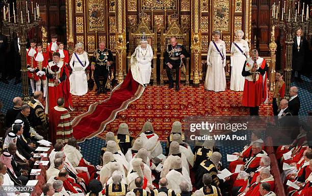 Queen Elizabeth II sits next to Prince Philip, Duke of Edinburgh with Prince Charles, Prince of Wales and Camilla, Duchess of Cornwall as she...