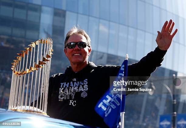 Manager Ned Yost of the Kansas City Royals waves to the crowd during a parade and celebration in honor of the Kansas City Royals' World Series win on...