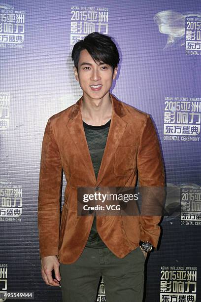 Singer and actor Chun Wu arrives at the red carpet of the 2015 Asian Influence Award Oriental Ceremony at Beijing Workers' Gymnasium on November 3,...