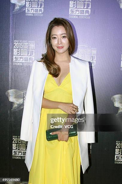 South Korea model and actress Kim Hee-sun arrives at the red carpet of the 2015 Asian Influence Award Oriental Ceremony at Beijing Workers' Gymnasium...