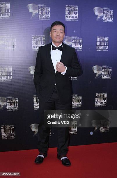Hong Kong singer, host and actor Wong He arrives at the red carpet of the 2015 Asian Influence Award Oriental Ceremony at Beijing Workers' Gymnasium...