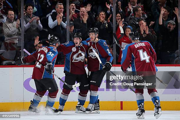 Matt Duchene of the Colorado Avalanche celebrates his goal against the Calgary Flames with Francois Beauchemin, Mikhail Grigorenko and Tyson Barrie...