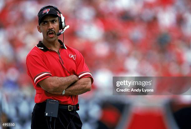 Tony Dungy of the Tampa Bay Buccaneers looks on from the sidelines during a game against the Denver Broncos at the Raymond James Stadium in Tampa...