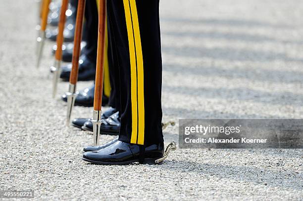 Members of the Royal Scots Dragoon Guard walk into the patio of Schloss Herrenhausen during the arrival of Prince Andrew, the Duke of York , at the...