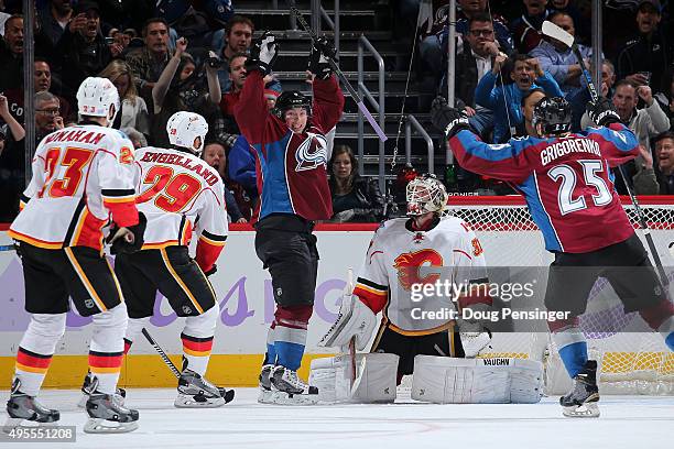 Matt Duchene of the Colorado Avalanche celebrates his goal against goalie Karri Ramo of the Calgary Flames to take a 5-3 lead in the third period at...