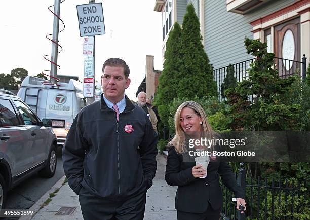 After Boston Mayoral primary, Marty Walsh with long time partner Lorrie Higgins walk down Savin Hill Ave.