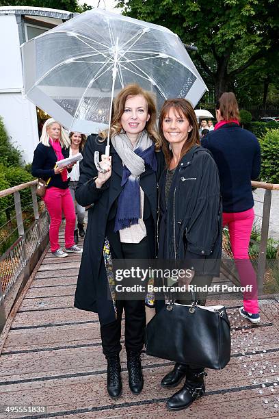 Valerie Trierweiler and journalist at Telematin Isabelle Chalencon attend the Roland Garros French Tennis Open 2014 - Day 11 on June 4, 2014 in...