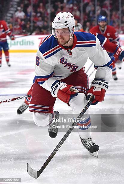 Anton Stralman of the New York Rangers skates for the puck against the Montreal Canadiens in Game Five of the Eastern Conference Final during the...
