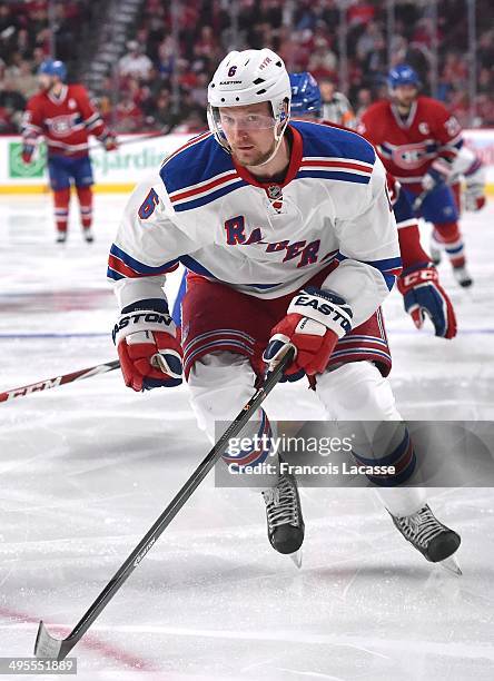 Anton Stralman of the New York Rangers skates for the puck against the Montreal Canadiens in Game Five of the Eastern Conference Final during the...