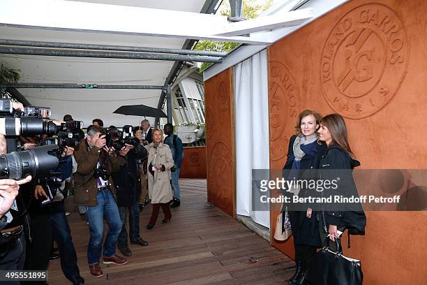 Valerie Trierweiler and journalist at Telematin Isabelle Chalencon attend the Roland Garros French Tennis Open 2014 - Day 11 on June 4, 2014 in...