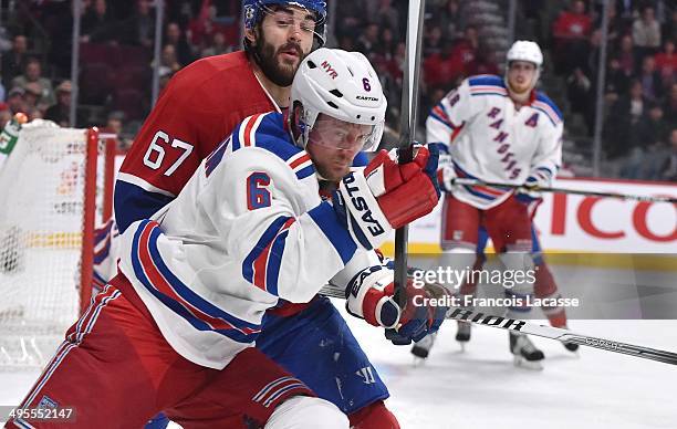 Max Pacioretty of the Montreal Canadiens and Anton Stralman of the New York Rangers battle for position in Game Five of the Eastern Conference Final...