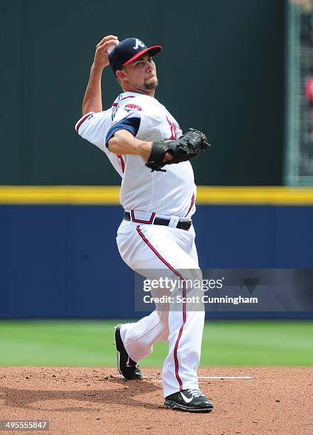 Mike Minor of the Atlanta Braves throws a first inning pitch against the Seattle Mariners at Turner Field on June 4, 2014 in Atlanta, Georgia.