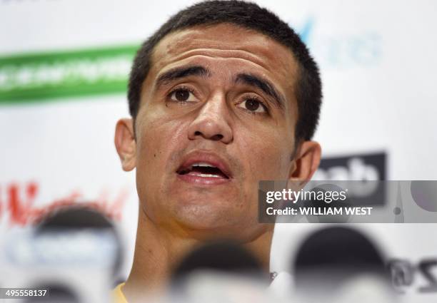 Australian Socceroos football player Tim Cahill speaks at a press conference after a team training run in Vitoria on June 4 as they prepare for the...