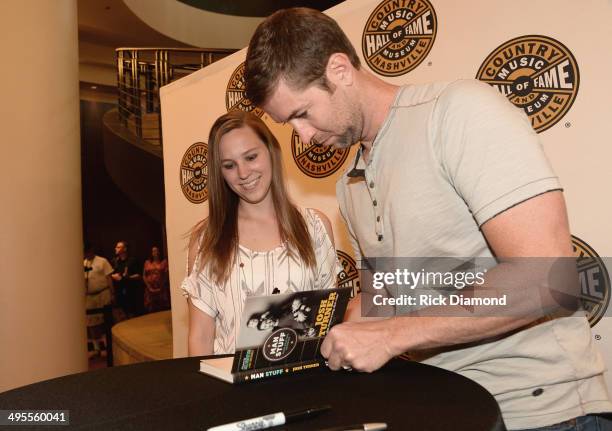 Josh Turner signs copies of his new book "Man Stuff" at Country Music Hall of Fame and Museum on June 4, 2014 in Nashville, Tennessee.