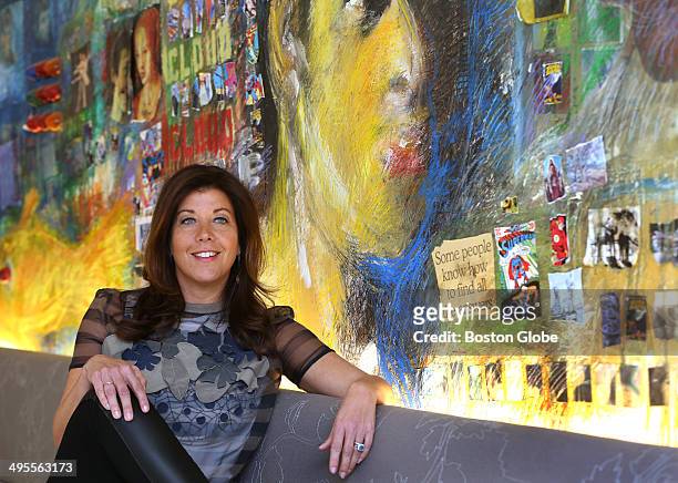 Kristen Cavallo has been promoted to president of the Boston advertising agency, Mullen. She is photographed in the cafe next to the mural "Unbound,"...