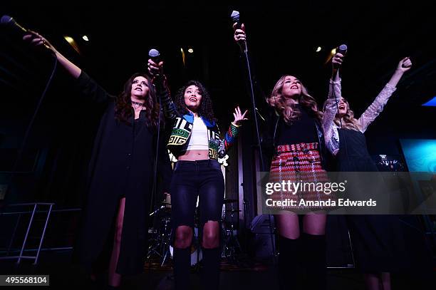 Singers Jesy Nelson, Leigh-Anne Pinnock, Jade Thirlwall and Perrie Edwards of the girl band Little Mix perform onstage at the Hard Rock Cafe,...