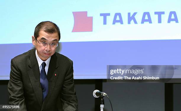 Japanese airbag maker Takata President Shigehisa Takada bows at hte end of a press conference on November 4, 2015 in Tokyo, Japan. Takata agreed with...