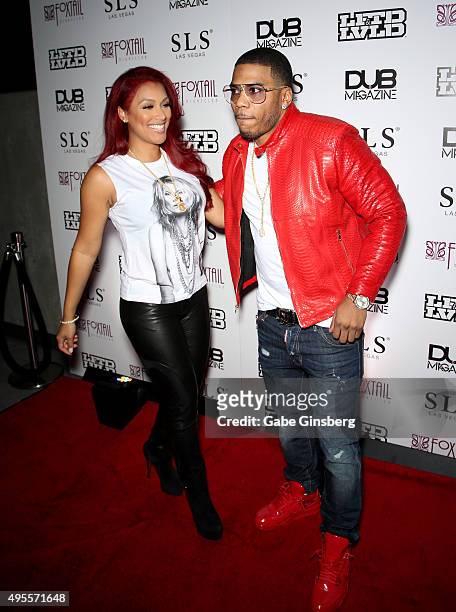 Model Shantel Jackson and rapper Nelly attends the DUB Magazine Specialty Equipment Market Association trade show party at Foxtail Nightclub at SLS...