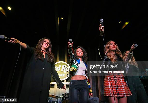 Singers Jesy Nelson, Leigh-Anne Pinnock, Jade Thirlwall and Perrie Edwards of the Girl Group Little Mix perform live at the Hard Rock Cafe on...