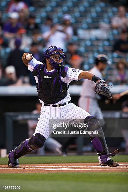 Catcher Wilin Rosario of the Colorado Rockies in action against the San Francisco Giants at Coors Field on May 20, 2014 in Denver, Colorado.