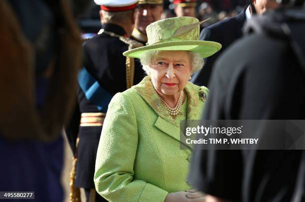 Britain's Queen Elizabeth II attends The Royal Marines 350th Anniversary Beating Retreat at Horseguards Parade in London on June 4, 2014. AFP...