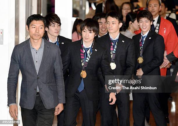 Japan Men's Gymnastics team head coahc Hisashi Mizutori, Ryohei Kato, Kohei Uchimura, Kenzo Shirai, Yusuke Tanaka and Naoto Hayasaka are seen on...