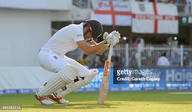 England captain Alastair Cook prepares to go out to bat during day four of the 3rd Test between Pakistan and England at Sharjah Cricket Stadium on...