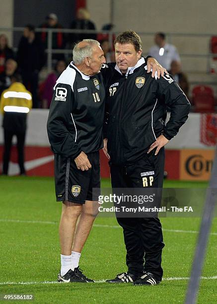 Rick Passmoor, ( Manager of Notts County Ladies is consoled at the end of the WSL Continental Cup Final between Arsenal Ladies and Notts County...