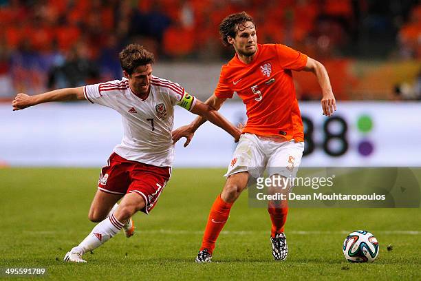 Daley Blind of Netherlands and Joe Allen of Wales battel for the ball during the International Friendly match between The Netherlands and Wales at...