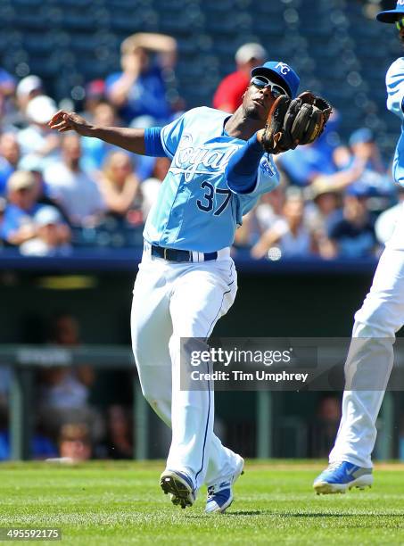 Pedro Ciriaco of the Kansas City Royals catches a fly ball during the 6th inning of the game against the Houston Astros at Kauffman Stadium on May...
