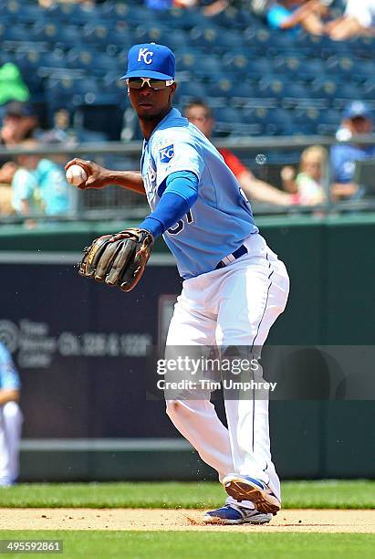 Pedro Ciriaco of the Kansas City Royals throws to first base during the 4th inning of the game against the Houston Astros at Kauffman Stadium on May...