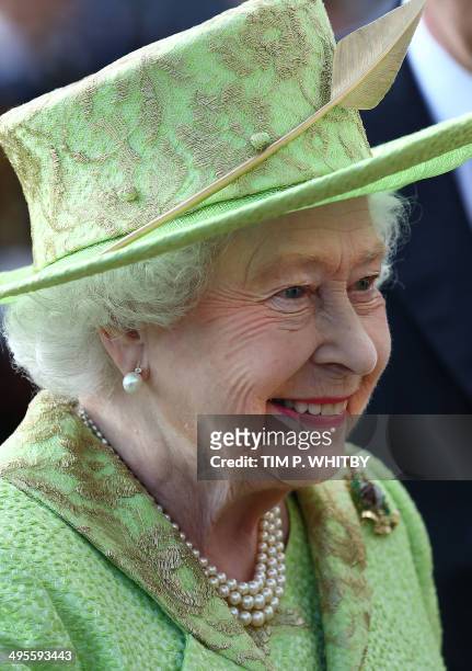Britain's Queen Elizabeth II attends The Royal Marines 350th Anniversary Beating Retreat at Horseguards Parade in London on June 4, 2014. AFP...