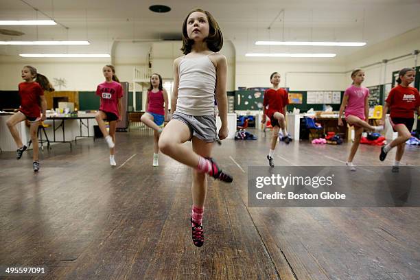 Isabella Fiore of Methuen dances during an O'Shea-Chaplin Academy of Irish Dance class at Lawrence Catholic Academy in Lawrence, Mass. On February...