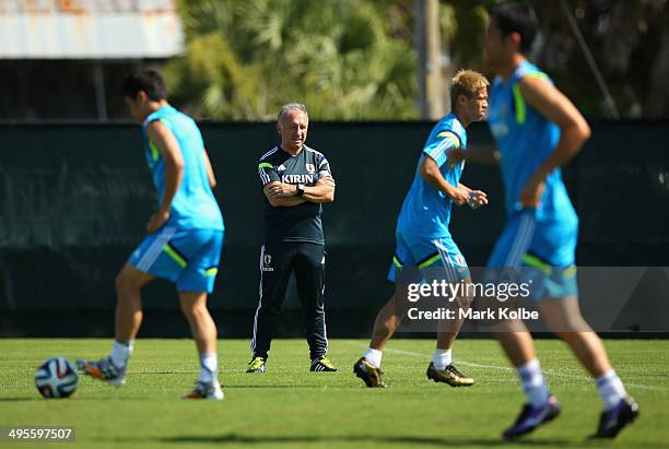 Japan head coach Alberto Zaccheroni watches on during a Japan training session at North Greenwood Recreation & Aquatic Complex on June 4, 2014 in...