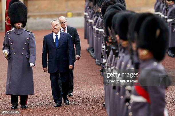 Kazakhstan President Nursultan Nazarbayev and Prince Philip, Duke of Edinburgh review an honour guard at Buckingham Palace on November 4, 2015 in...