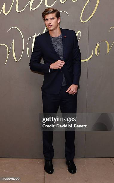 Toby Huntington-Whiteley arrives at the Burberry Festive film premiere at 121 Regent Street on November 3, 2015 in London, England.