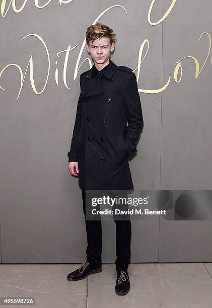 Thomas Brodie-Sangster arrives at the Burberry Festive film premiere at 121 Regent Street on November 3, 2015 in London, England.