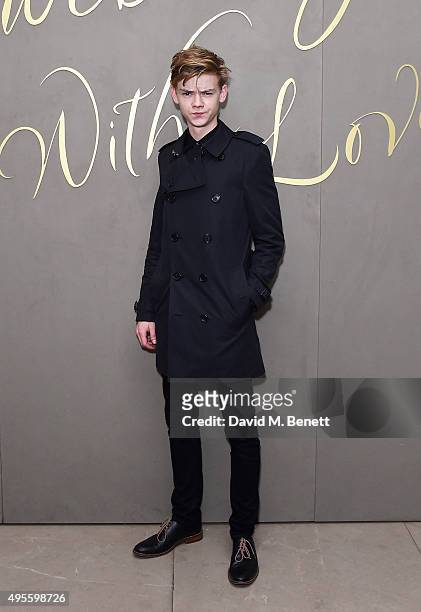 Thomas Brodie-Sangster arrives at the Burberry Festive film premiere at 121 Regent Street on November 3, 2015 in London, England.