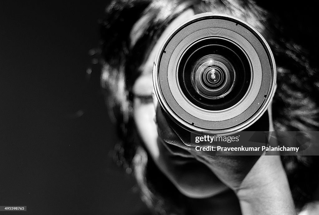 Portrait of a girl child with a lens