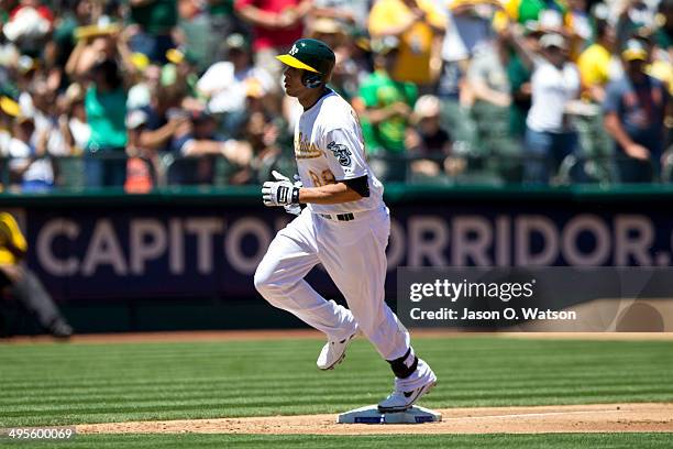 Kyle Blanks of the Oakland Athletics rounds the bases after hitting a home run off of Drew Smyly of the Detroit Tigers during the second inning at...