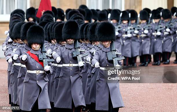 An honour guard arrives for an inspection by Kazakhstan President Nursultan Nazarbayev and Prince Philip, Duke of Edinburgh at Buckingham Palace on...