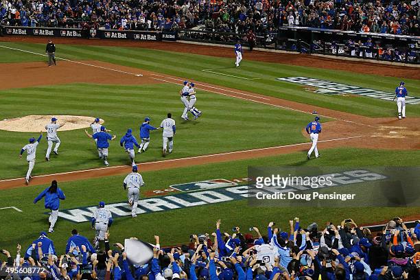 The Kansas City Royals celebrate defeating the New York Mets to win Game Five of the 2015 World Series at Citi Field on November 1, 2015 in the...