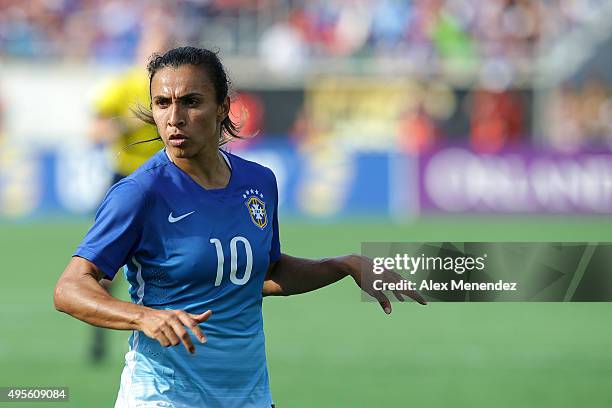 Marta of Brazil dribbles the ball during a women's international friendly soccer match between Brazil and the United States at the Orlando Citrus...