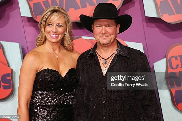 Tracy Lawrence and wife Becca attend the 2014 CMT Music awards at the Bridgestone Arena on June 4, 2014 in Nashville, Tennessee.