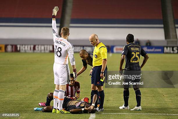 Zac MacMath of Philadelphia Union calls for the doctor after Maurice Edu of Philadelphia Union is tripped by Eric Avila of Chivas USA in the second...